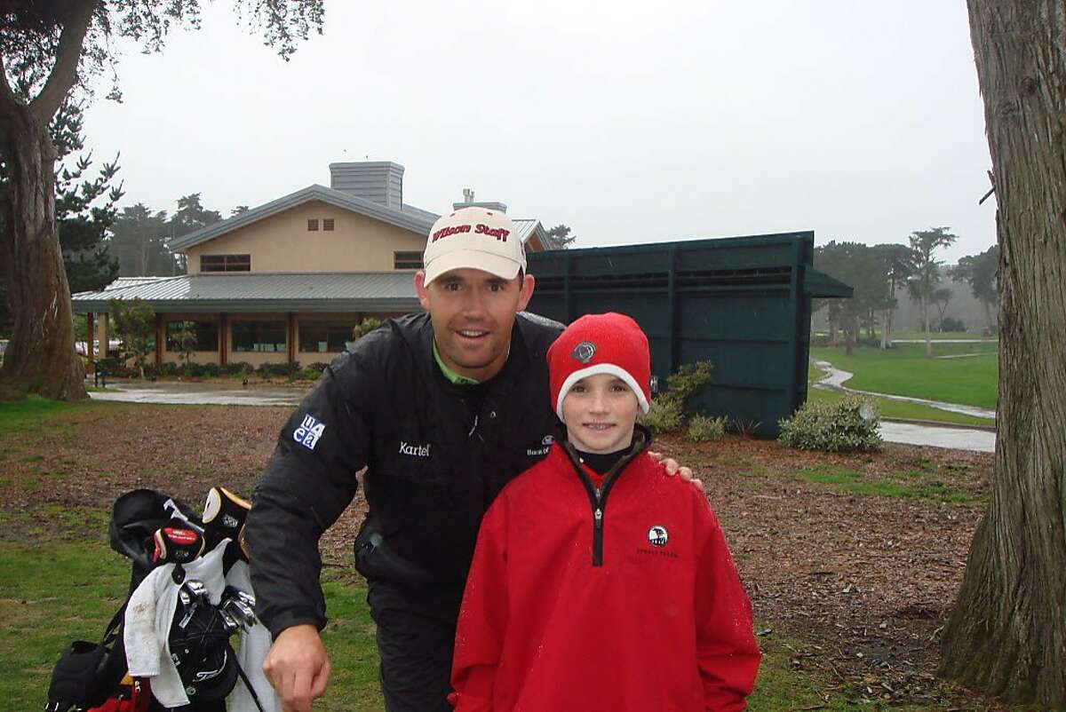 Three-time major champion Padraig Harrington poses with Daniel Connolly, then 10, after they were part of a group playing at Harding Park in February 2008. Connolly, now 18, won the San Francisco City Championship at Harding on Sunday.