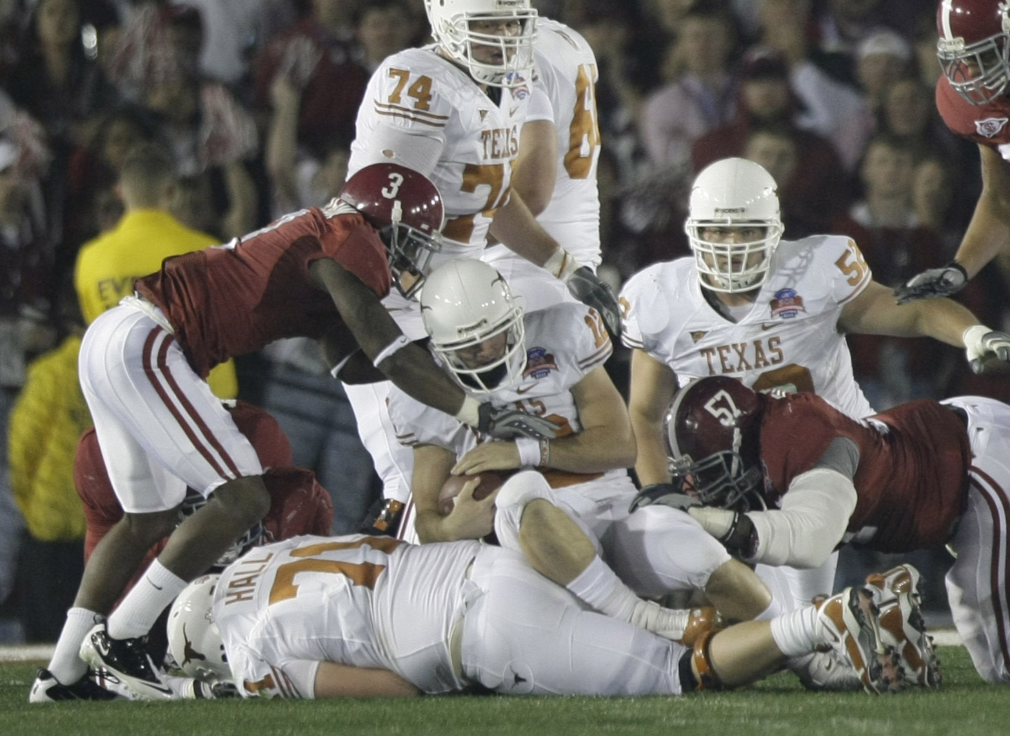 Photo: Texas quarterback Colt McCoy is tackled by Alabama Marcell Dareus  during BCS Championship game the Rose Bowl in Pasadena, California -  LAP20100107404 