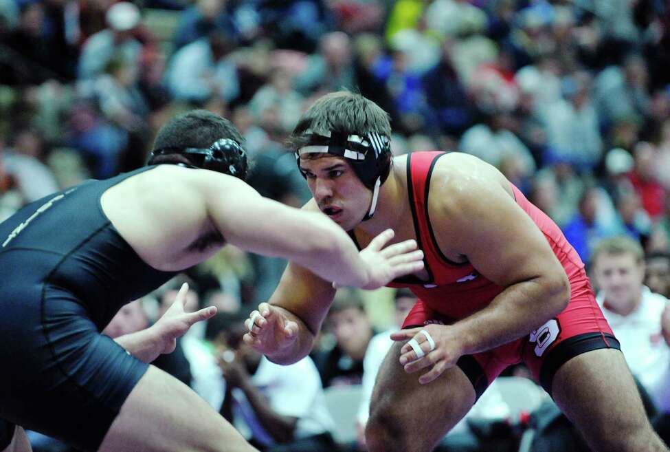 TrevorSmith of Army, left and Nick Gwiazdowski of NC State compete in the 285 pound weight class at the Journeymen II Asics Northeast Duals on Sunday, Nov. 15, 2015, in Troy, N.Y. Gwiazdowski is from Duanesburg. (Paul Buckowski / Times Union)