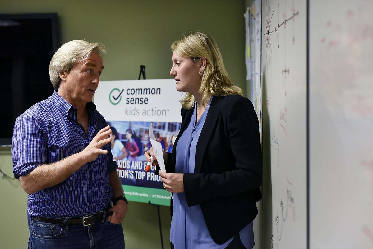 California campaign director Buffy Wicks, right, speaks with CEO Jim Steyer following a meeting at Common Sense Media's offices in San Francisco, CA Wednesday, March 16, 2016.