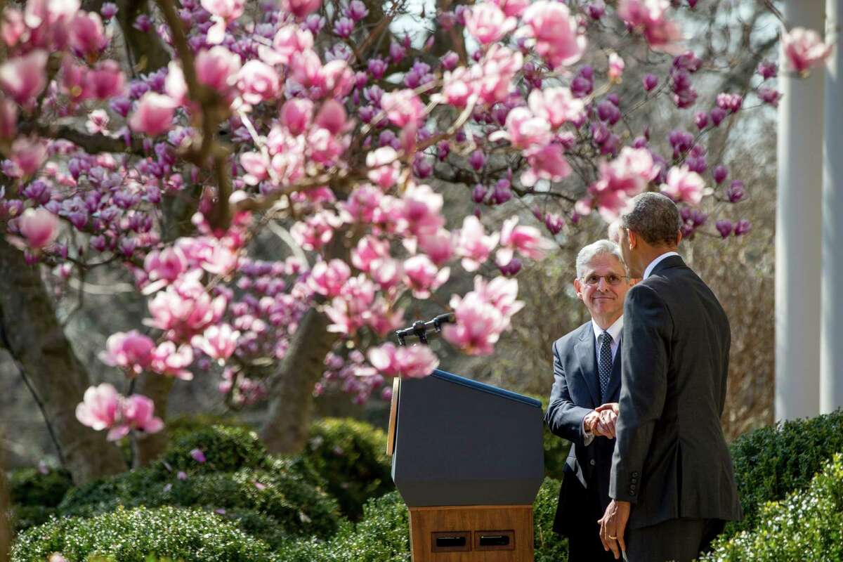 Federal appeals court judge Merrick Garland shakes hands with President Barack Obama as he is introduced as Obamaís nominee for the Supreme Court during an announcement in the Rose Garden of the White House, in Washington, Wednesday, March 16, 2016. (AP Photo/Andrew Harnik)