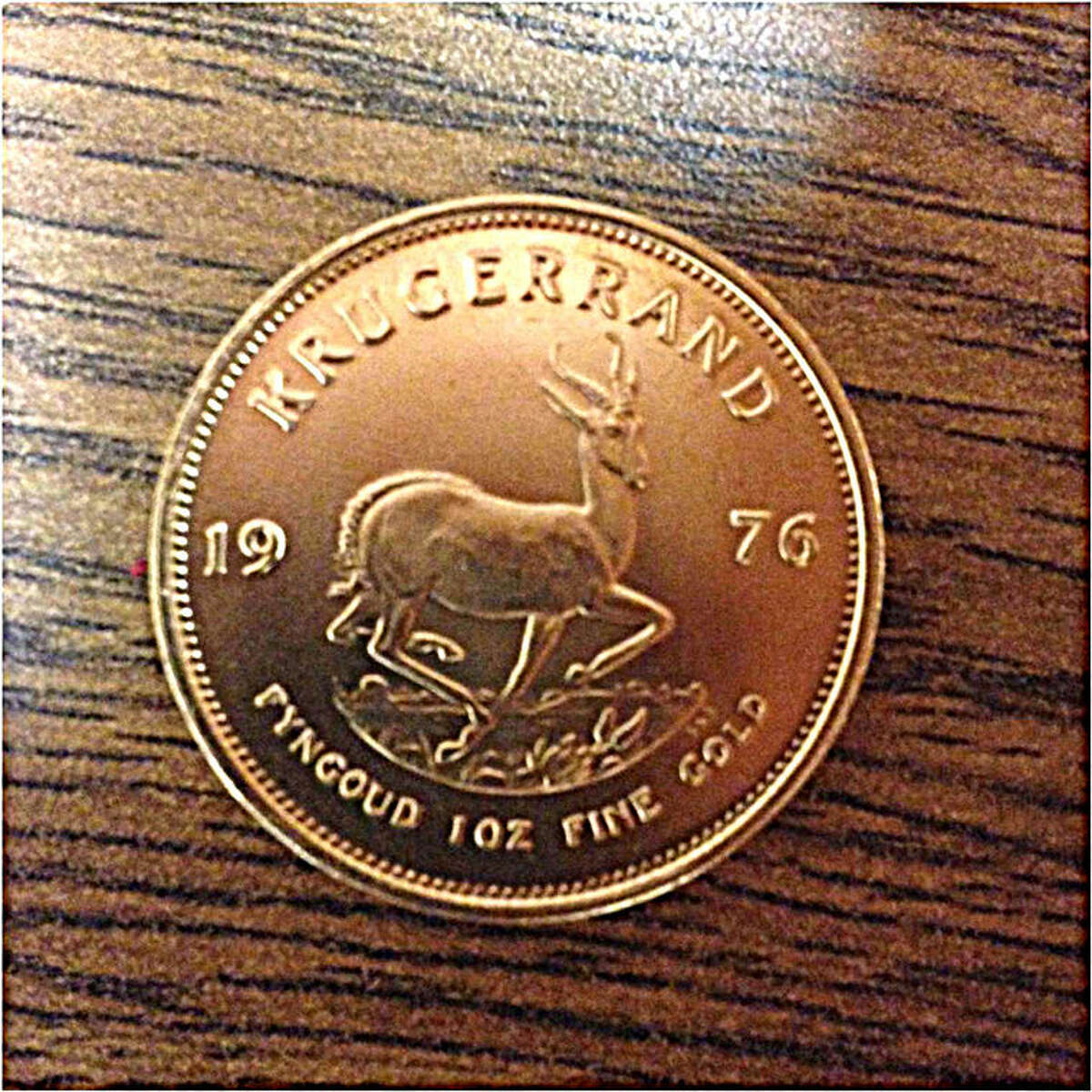 The South African Krugerrand coin, made from one ounce of gold, is estimated at $1,100.