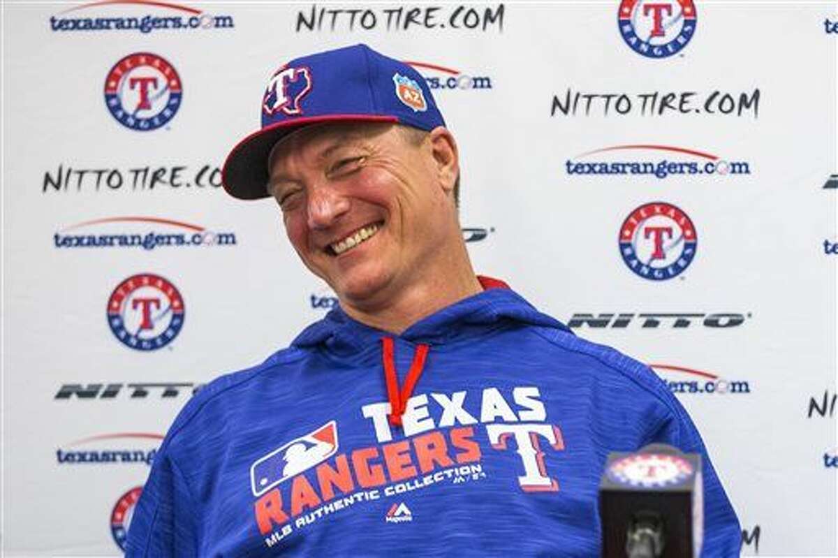 Texas Rangers manager Jeff Banister smiles while discussing his contract extension during a news conference before the first full spring training baseball workout for pitchers and catchers at the team's training facility on Friday, Feb. 19, 2016, in Surprise, Ariz. (Smiley N. Poo/The Dallas Morning News via AP) MANDATORY CREDIT; MAGAZINES OUT; TV OUT; INTERNET USE BY AP MEMBERS ONLY; NO SALES