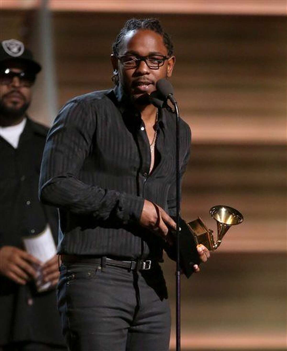 Kendrick Lamar accepts the award for best rap album for “To Pimp A Butterfly” at the 58th annual Grammy Awards on Monday, Feb. 15, 2016, in Los Angeles.