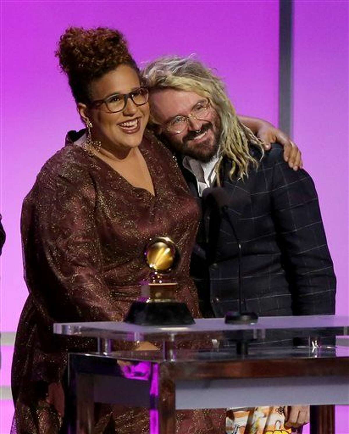 Brittany Howard, left, of Alabama Shakes, and Shawn Everett accept the award for best alternative music album for “Sound & Color” at the 58th annual Grammy Awards on Monday, Feb. 15, 2016, in Los Angeles.