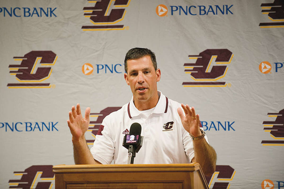 Central Michigan University's head football coach Dan Enos talks to the media last August before the start of the 2014 season.