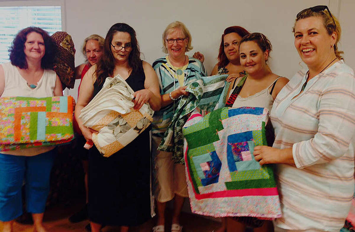 Open Door's House of Mercy guests receive quilts