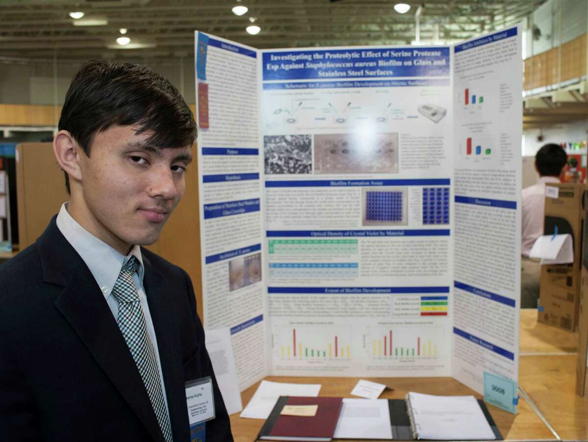 Greenwich High School student Takema Kajite, with his entry at the Connecticut Science & Engineering Fair at Quinnipiac University in Hamden on Thursday.