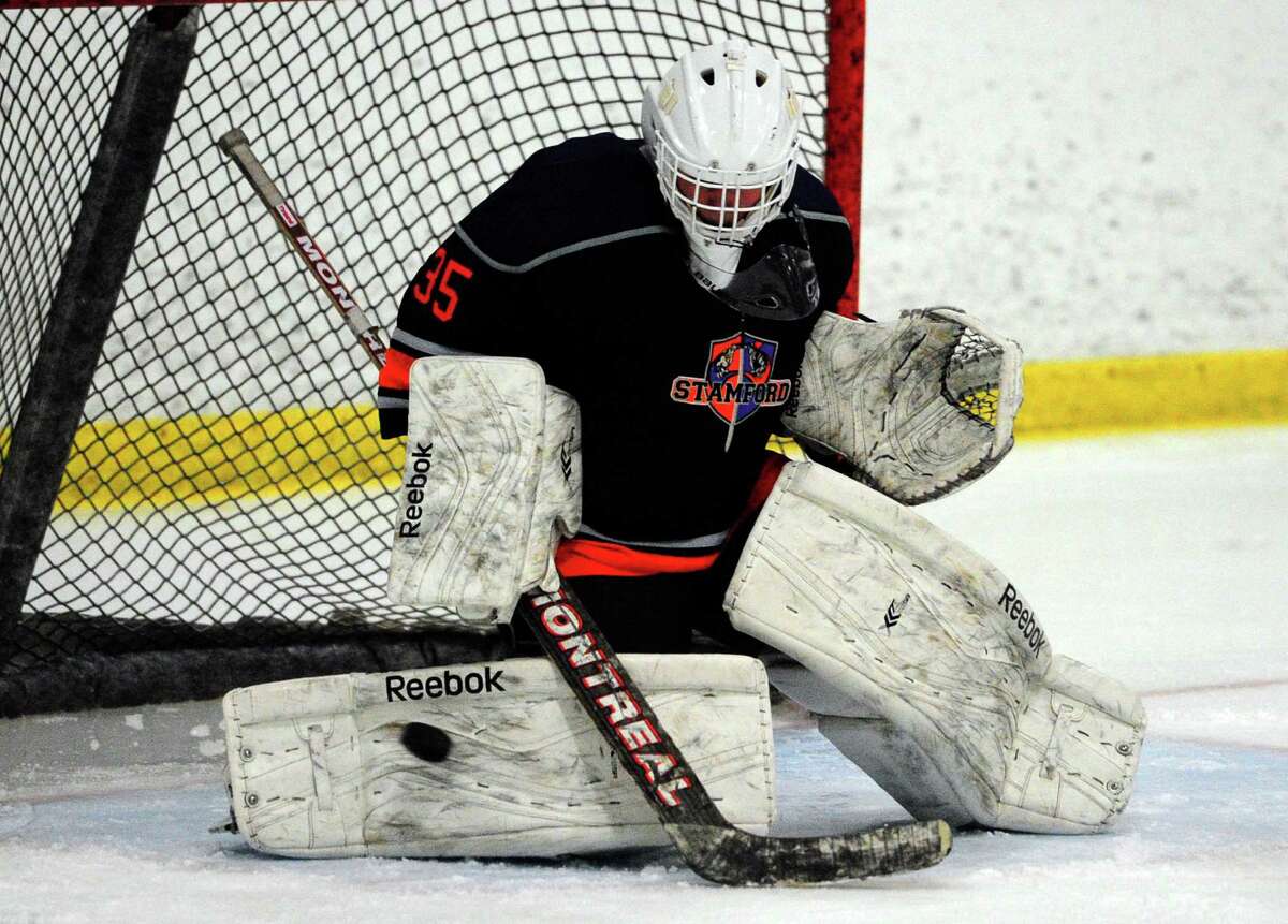 Stamford Co-op goalie Christian Compolattaro in boys hockey action between Stamford Co-op and St. Joseph at The Rinks in Shelton, Conn., on Thursday Feb. 18, 2016.