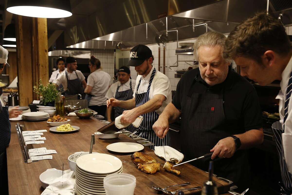 Chef Jonathan Waxman (right) on opening night of his Waxman restaurant at Ghirardelli Square in San Francisco, California on Friday March 18, 2016.