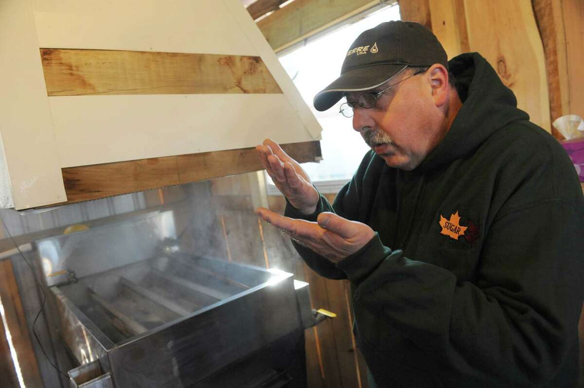 Owner Erich Ruger gives an overview of the maple syrup making process in his sugarhouse during an open house at Sugar Oak Farms on Saturday March 19, 2016 in Malta, N.Y. (Michael P. Farrell/Times Union)