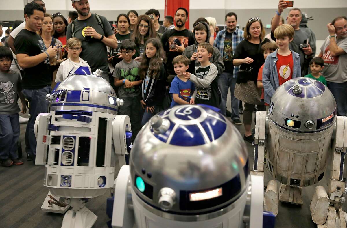 R2 Builders, enthusiasts of the Star Wars droids display their creations for the visitors to see during the Silicon Valley Comic Con 2016, on Sat. March 19, 2016, at the San Jose Convention Center in San Jose, California.