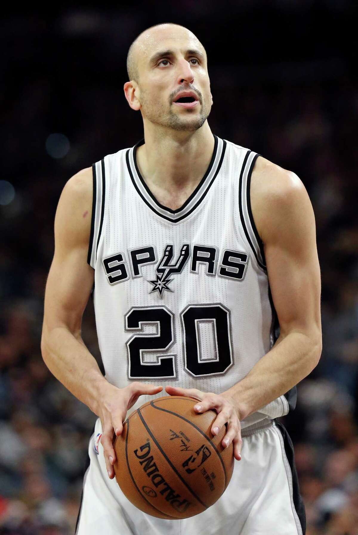 Spurs’ Manu Ginobili shoots a free throw during second half action against the Orlando Magic on Feb. 1, 2016 at the AT&T Center.
