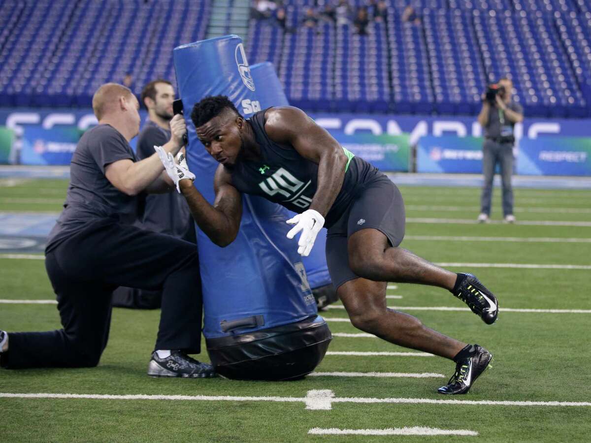 Maryland defensive lineman Yannick Ngakoue runs a drill at the NFL football scouting combine on Tuesday, March 1, 2016, in Indianapolis.