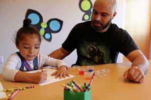 Families mix art, science at the library