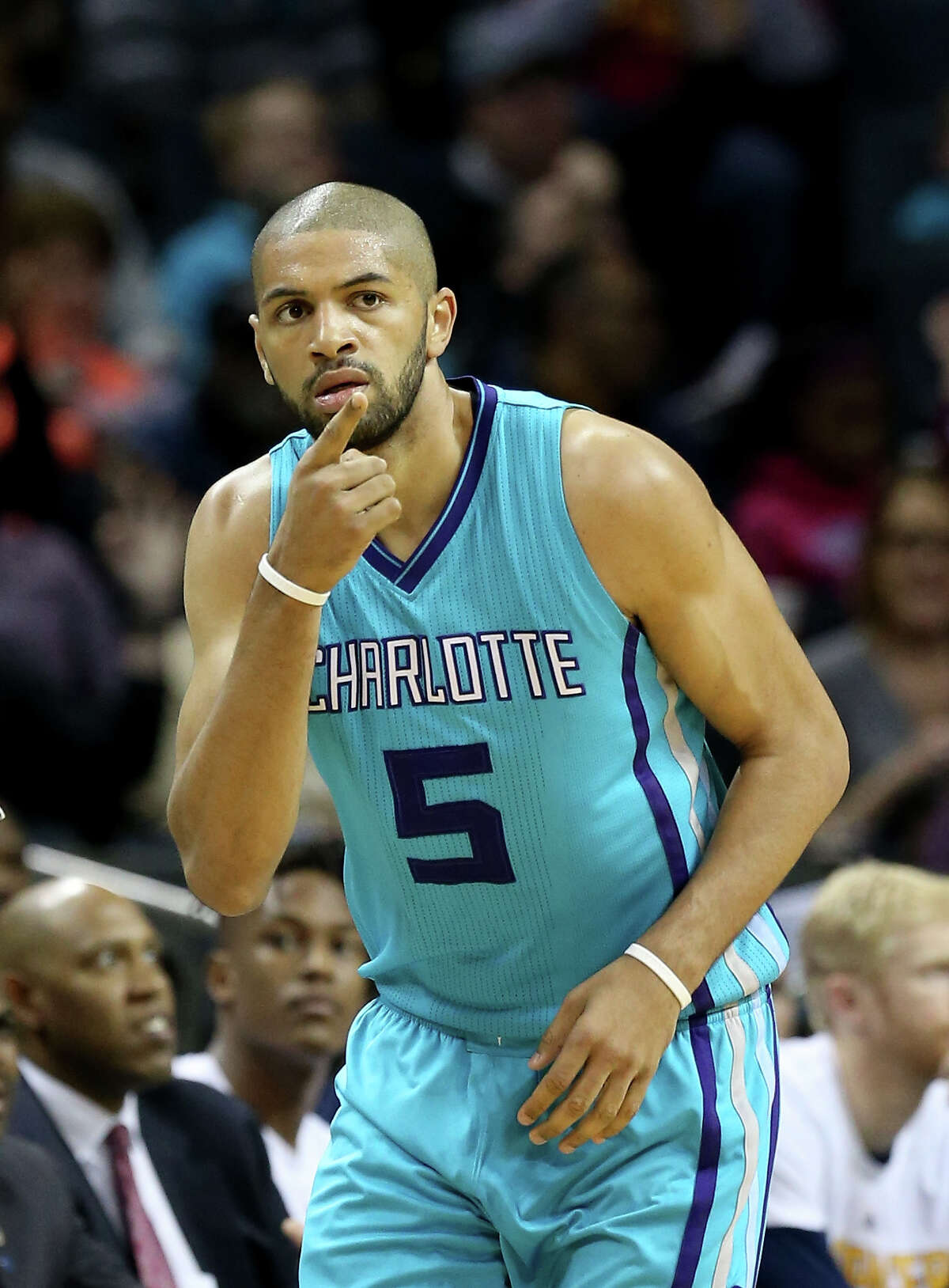 CHARLOTTE, NC - MARCH 04: Nicolas Batum #5 of the Charlotte Hornets reacts after a play during their game against the Indiana Pacers at Time Warner Cable Arena on March 4, 2016 in Charlotte, North Carolina. NOTE TO USER: User expressly acknowledges and agrees that, by downloading and or using this photograph, User is consenting to the terms and conditions of the Getty Images License Agreement.