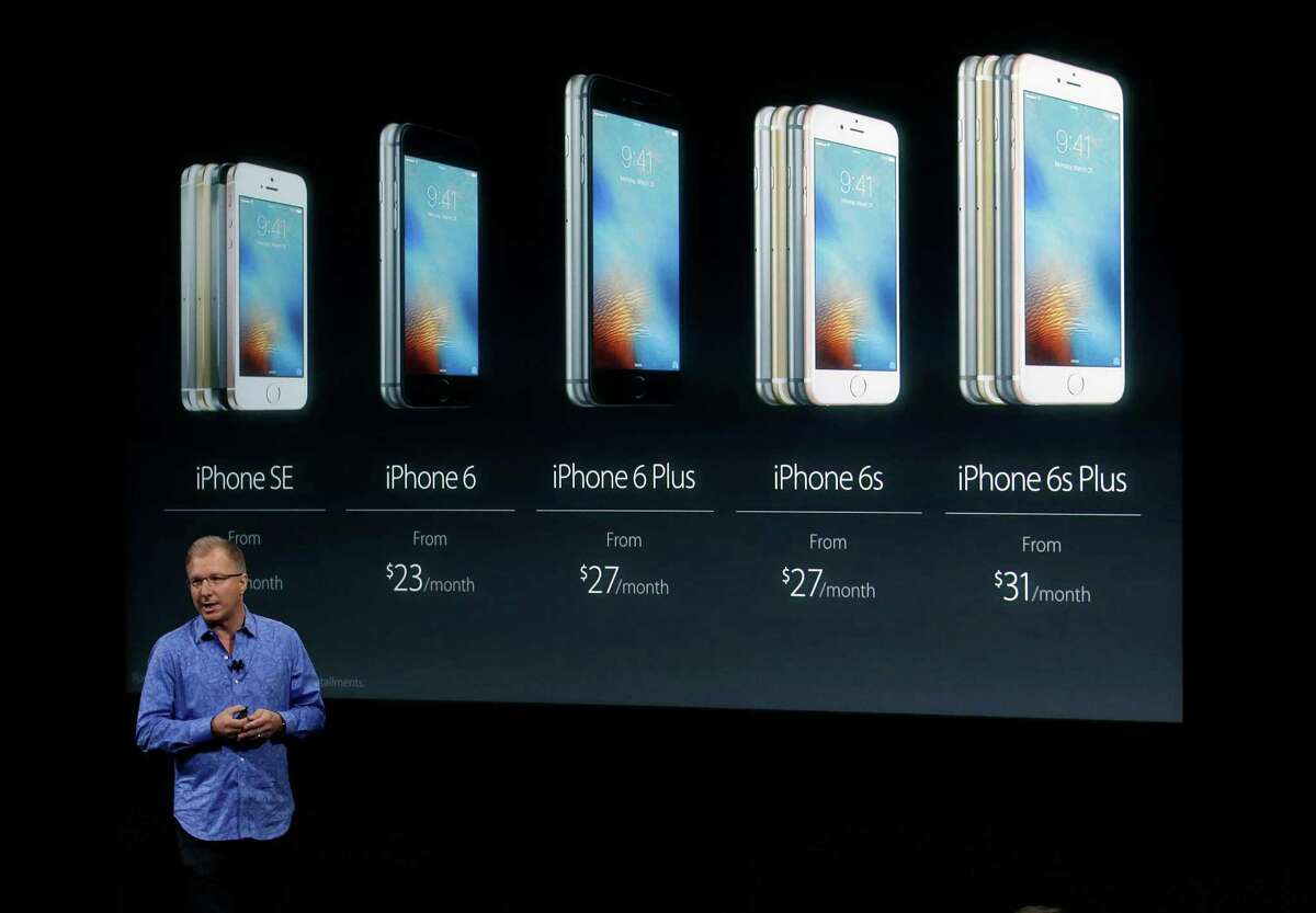 Greg Joswiak, vice president of iOS, iPad and iPhone product marketing, announces the new iPhone SE at Apple headquarters Monday, March 21, 2016, in Cupertino, Calif.