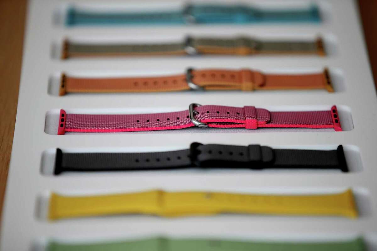 New Apple Watch bands are displayed during Monday’s special event. Prices now will start at $299, down from $349.