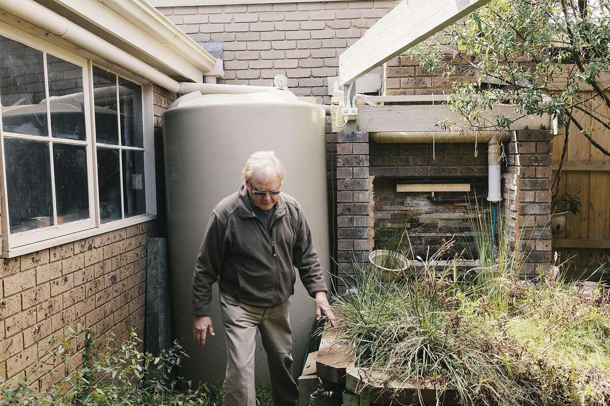 John Harvey, retired Melbourne homeowner who has an impressive array of recycled and grey water installed in his home. Shot in Glen Waverly, Victoria, Australia on September 2, 2015.