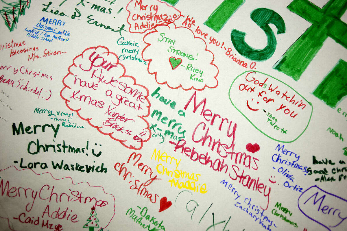 Notes from Northeast Middle School students are seen on a banner made for Addie Fausett, a 6-year-old Utah girl who is dying from an undiagnosed illness causing cerebral atrophy.