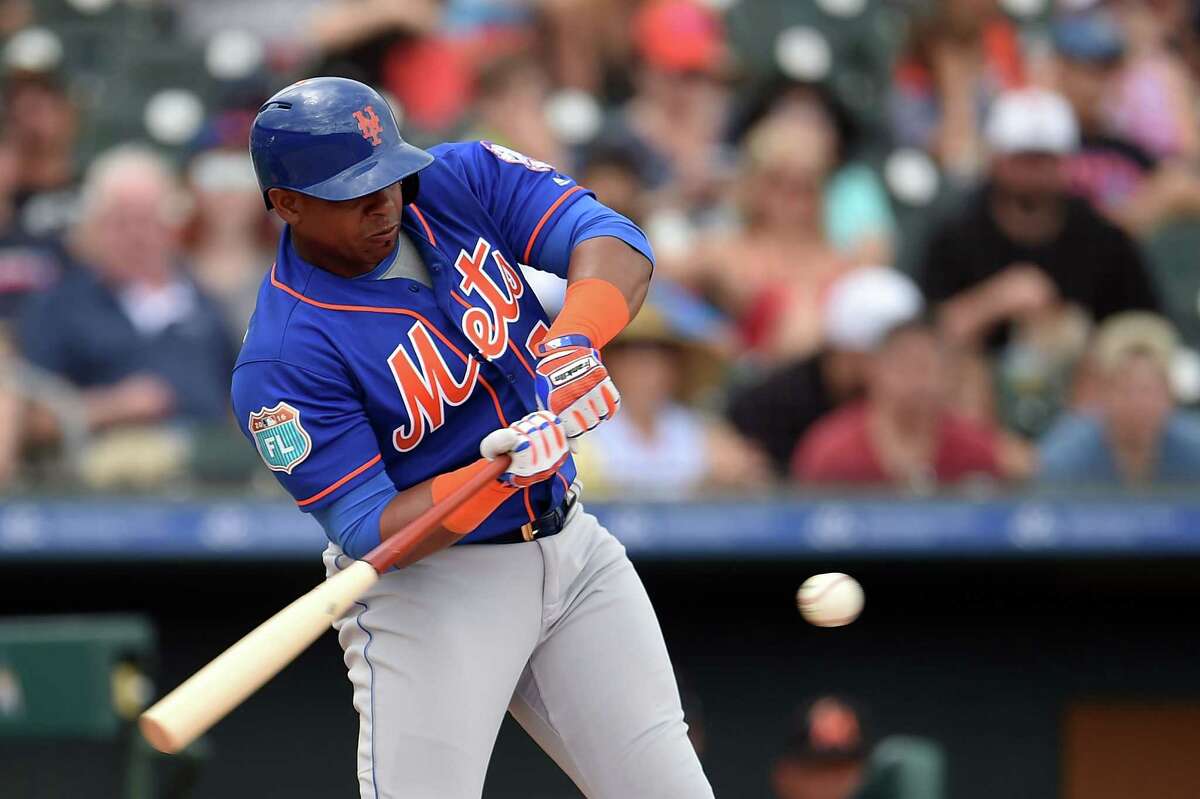 JUPITER, FL - MARCH 13: Yoenis Cespedes #52 of the New York Mets swings at a pitch during the fifth inning of a spring training game against the Miami Marlins at Roger Dean Stadium on March 13, 2016 in Jupiter, Florida. (Photo by Stacy Revere/Getty Images) ORG XMIT: 604599647