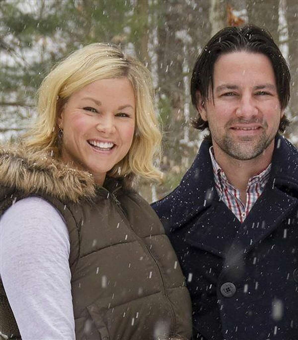 In this January 2014 photo, Thomas and Kelley Clayton pose in Caton, N.Y. Thomas Clayton, a former minor league hockey player has been charged with killing his wife inside their upstate New York home, authorities said. The Steuben County sheriff's office said deputies and state troopers responded to Thomas Clayton's home in Caton, near the Pennsylvania border, after he called 911 early Tuesday, Sept. 29, 2015, and said he found his wife dead. (Jeff Richards/The Star-Gazette via AP) 