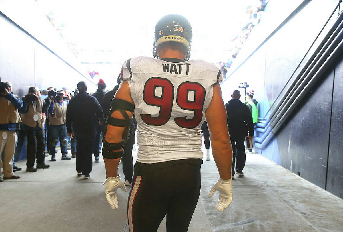 ORCHARD PARK, NY - DECEMBER 6: J.J. Watt #99 of the Houston Texans takes the field as he walks out from the runway before the start of their game against the Buffalo Bills during NFL game action at Ralph Wilson Stadium on December 6, 2015 in Orchard Park, New York.