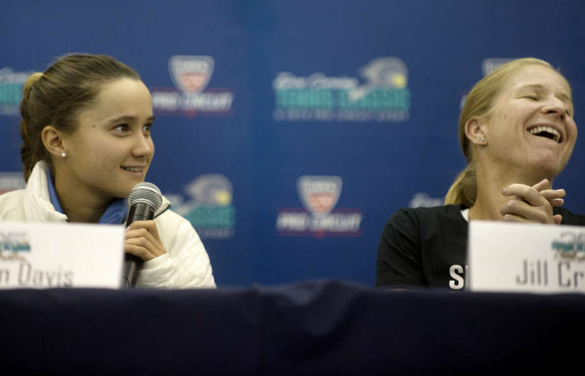 NICK KING | nking@mdn.netTennis pros Lauren Davis, left, and Jill Craybas participate in a Dow Corning Tennis Classic press conference Monday at the Midland Tennis Center.