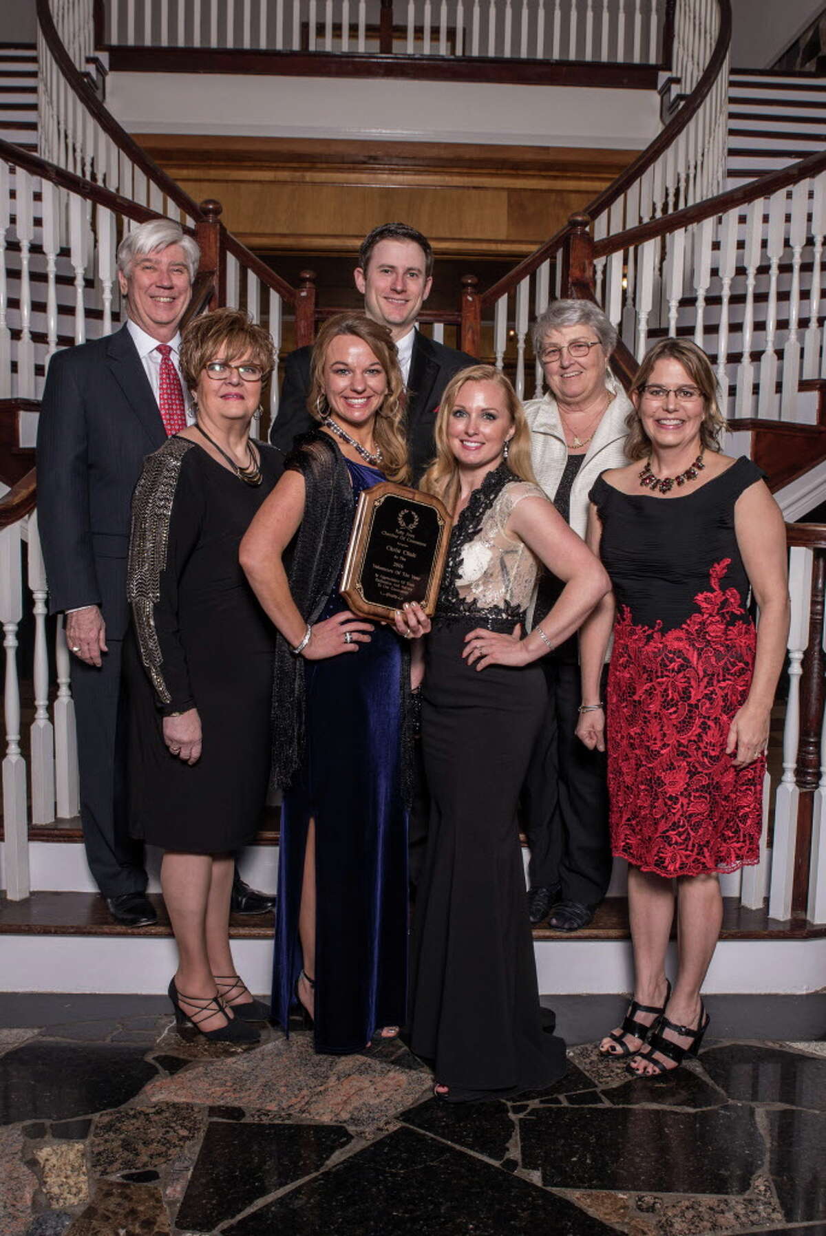 Christ Clinic was recognized by the Katy Area Chamber of Commerce as the Volunteers of the Year at the chamber's gala in February. From left, back row, are: Ken Janda, Allan Kirk and Rev. Gil Keyworth; front row: Sherry Nelson, Kara Hill, Lara Hamilton and Dr. Cindy Anthis.