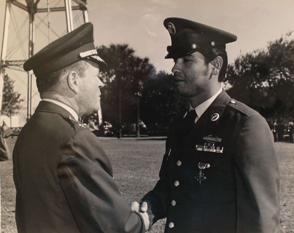 A photograph of Medal of Honor recipient Santiago Erevia during the ceremony for his Distinguished Service Cross, the second highest military decoration, when he returned from Vietnam at Fort Sam Houston.
