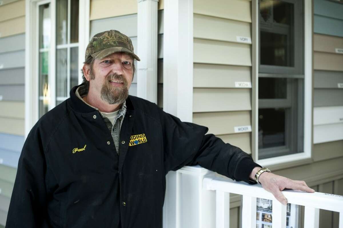NEIL BLAKE | nblake@mdn.netSiding World assistant manager Paul Brown has been working at the business for 18 years. The business sellls LP SmartSide, a relatively new product in the housing market.