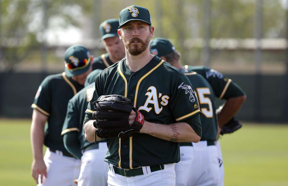 Pitcher John Axford, 61 during the Oakland Athletics spring training workouts on Monday February 29, 2016, in Mesa, Arizona.