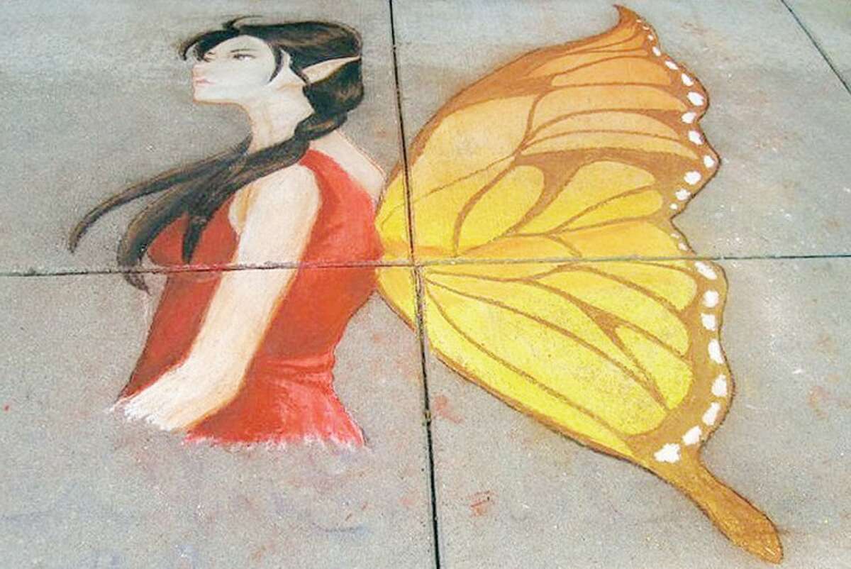 A mural by Devin Manges and Maria Seger on the sidewalk in front of the Sleepy Hollow Bookshop.