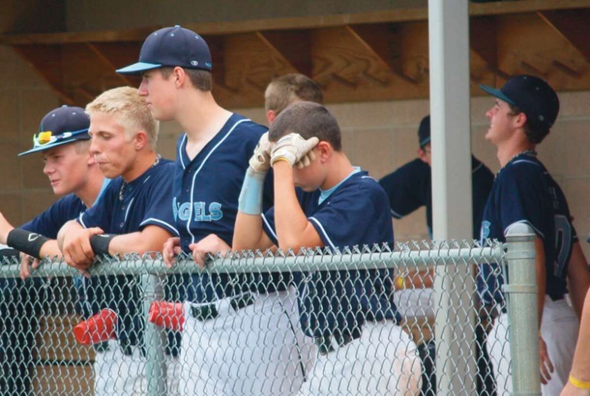 photo providedBaseball Heaven Angels’ (from left) Connor Smith, Jarred LaChance, Alex Sova, Jackson Worsley and Luke Anderson stay loose in the dugout during a game at the CABA World Series in South Bend, Ind.