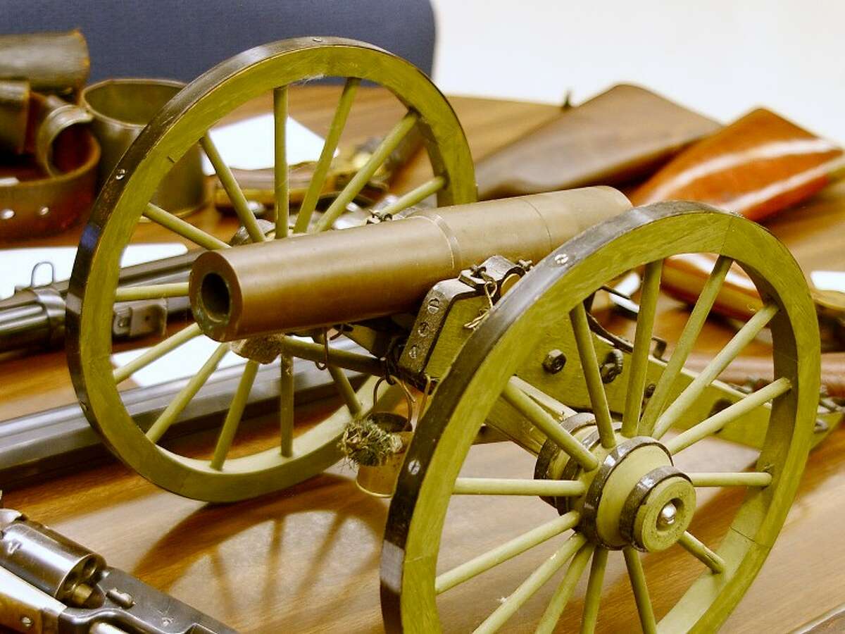 STUART FROHM | for the Daily NewsDisplayed at the senior citizens center in Sanford Tuesday were a one-sixth scale model of a Civil War artillery carriage built by center member Tom Cherry of Geneva Township plus authentic and reproduction Civil War-era firearms and ammunition.