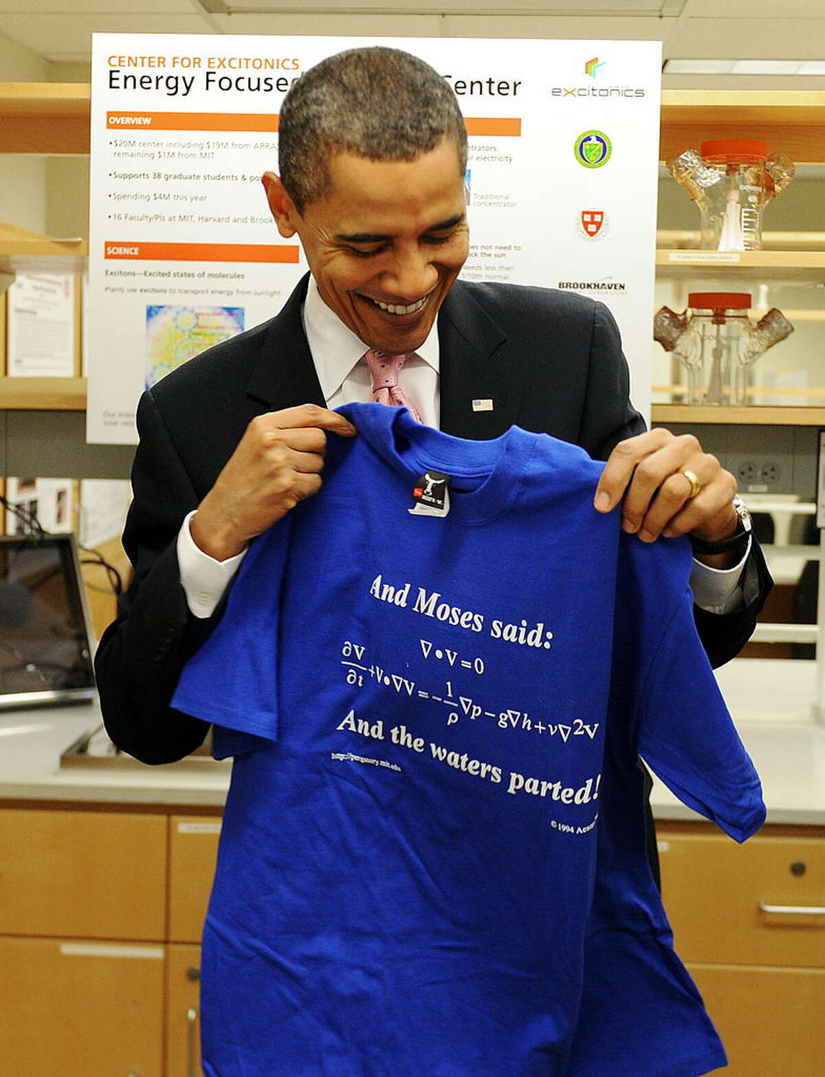 U.S. President Barack Obama holds a T-shirt given to him as he toured a research laboratory at the Massachusetts Institute of Technology in Cambridge, Mass., on Oct. 23, 2009. Take look at some of the controversies that have plagued Texas Agriculture Commissioner Sid Miller. 