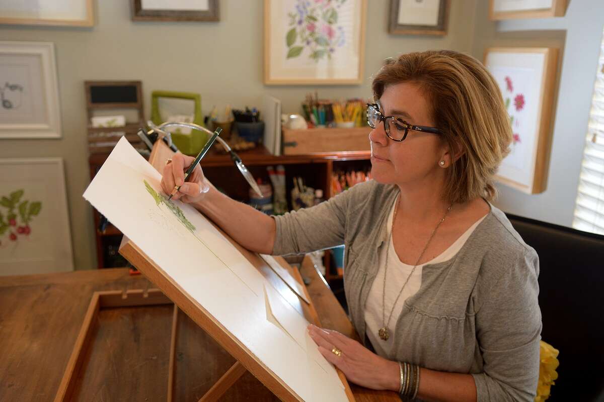 Artist Betsy Barry uses colored pencils to create works of art in Kingwood. Her art is inspired by a variety of plants and vegetables and one piece, "Macular Pomifera Osage Orange" is part of a U.S. Botanic Garden art show in Washington, D.C.