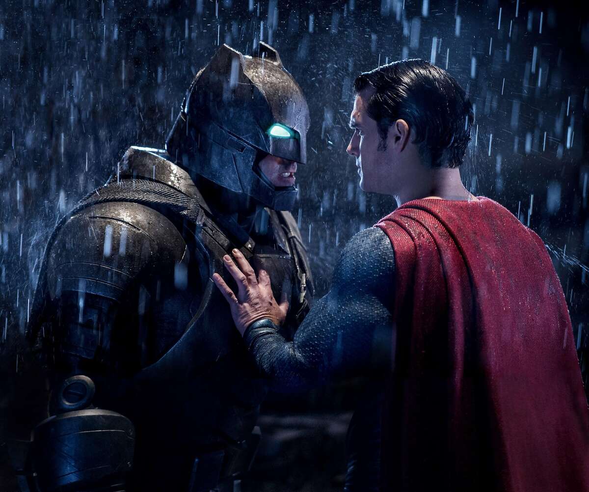 This image released by Warner Bros. Entertainment shows Ben Affleck as Batman, left, and Henry Cavill as Superman in a scene from, "Batman V. Superman: Dawn Of Justice." (Clay Enos/Warner Bros. Entertainment via AP)