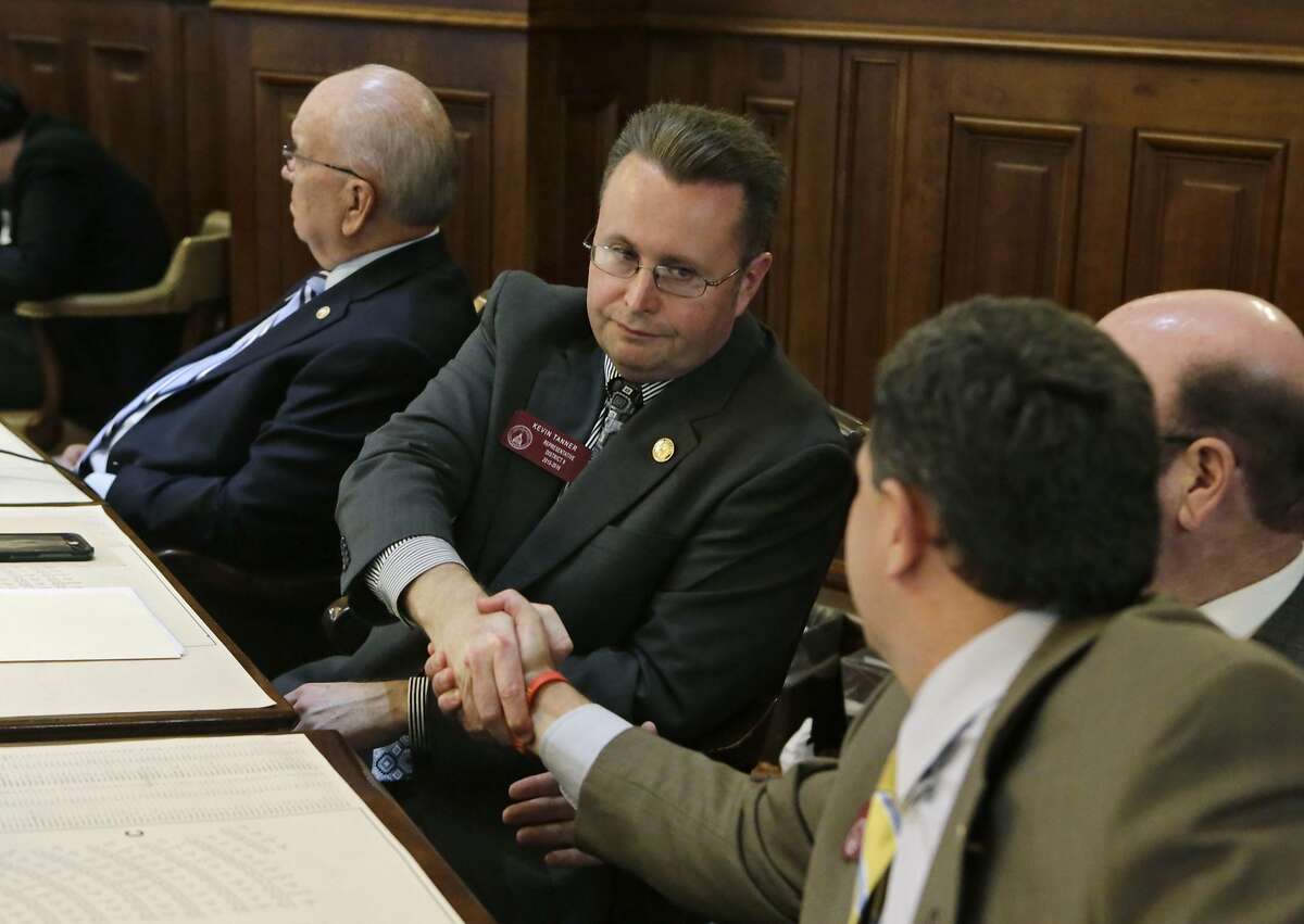 Rep. Kevin Tanner , R-Dawsonville, sponsor of HB 757, is congratulated after the measure passed Wednesday, March 16, 2016, in Atlanta. The Georgia House on Wednesday approved changes to the contentious bill protecting opponents of same-sex marriage. The changes sent to the Senate would protect religious officials who decline performing gay marriages, prevent government burden of religious belief and also prevent government penalty against faith-based organizations, including refusal to serve or hire someone. (Bob Andres/Atlanta Journal-Constitution via AP) MARIETTA DAILY OUT; GWINNETT DAILY POST OUT; LOCAL TELEVISION OUT; WXIA-TV OUT; WGCL-TV OUT; MANDATORY CREDIT
