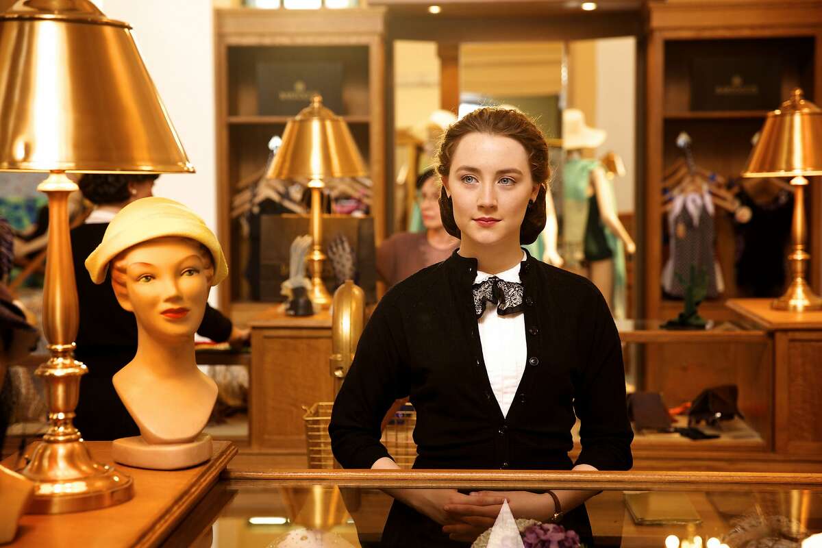 This photo provided by Fox Searchlight shows, Saoirse Ronan as Eilis in a scene from the film, "Brooklyn." The movie opens in U.S. theaters on Nov. 4, 2015. (Kerry Brown/Fox Searchlight via AP)
