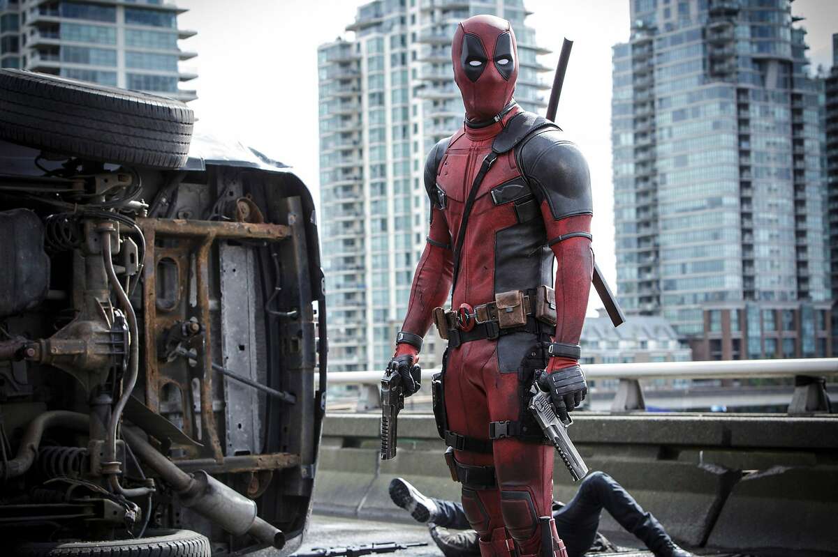 This image released by Twentieth Century Fox shows Ryan Reyonlds in a scene from the film, "Deadpool." (Joe Lederer/Twentieth Century Fox Film Corp. via AP)