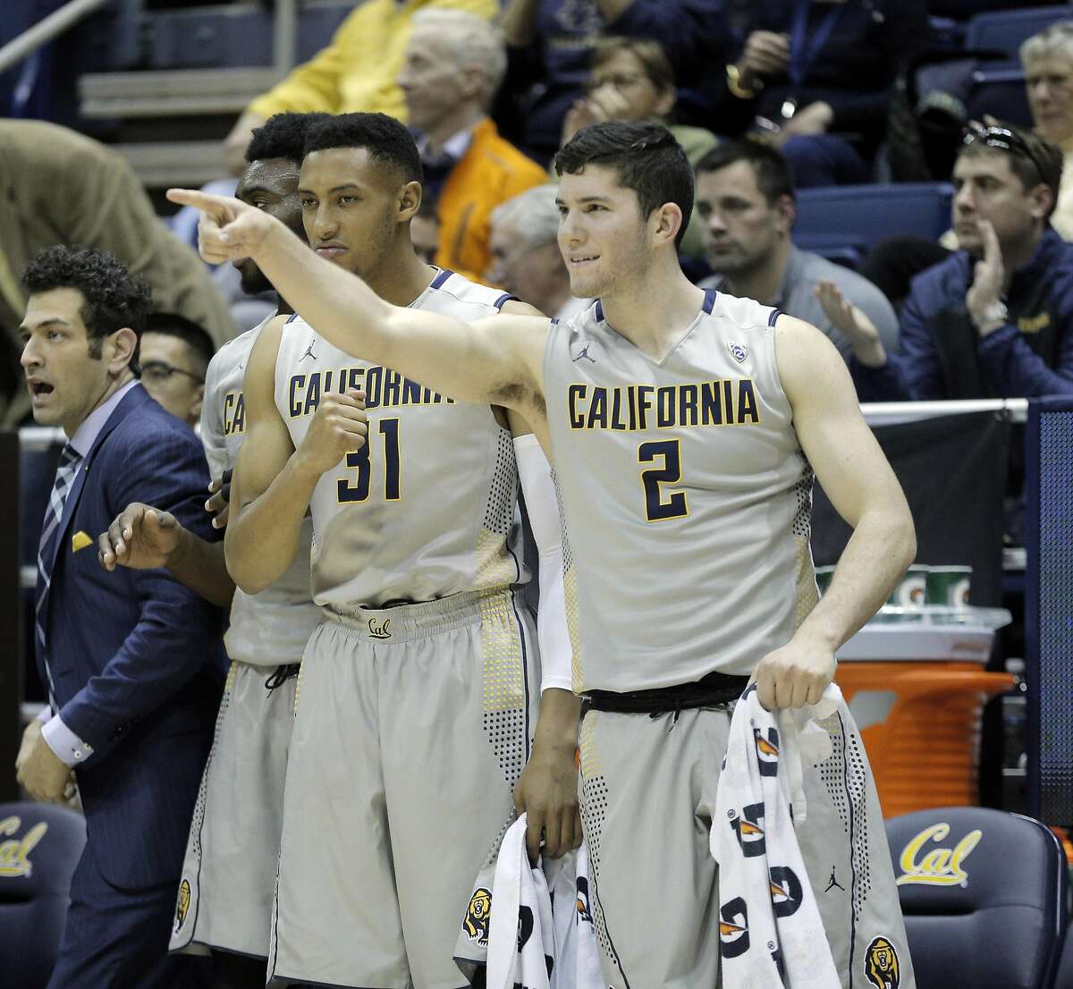 Sam Singer (2) and Stephen Domingo (31) gesture to teammates from the bench in the second half as the Cal Bears played the Seattle University Redhawks at Haas Pavilion in Berkeley, Calif., on Tuesday, December 1, 2015. Cal won 66-52.