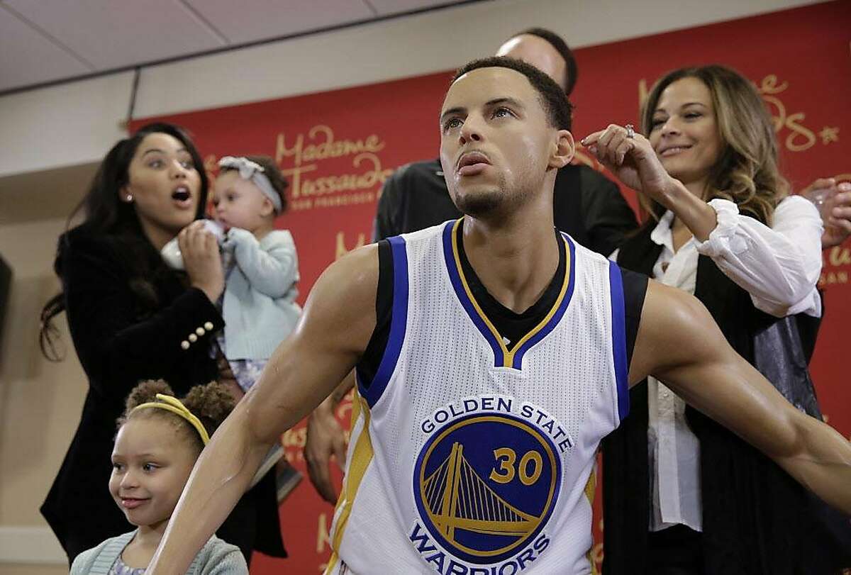 Ayesha Curry, left, reacts as Sonya Curry, right, takes a closer look at a wax figure of her son. It was unveiled March 24, 2016 and is on display at Madame Tussauds wax museum at Fisherman's Wharf.