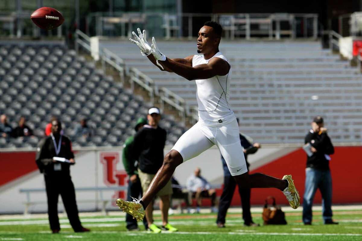 Cornerback William Jackson III runs a drill during the University of Houston's pro day Thursday with representatives from 31 NFL teams on hand.