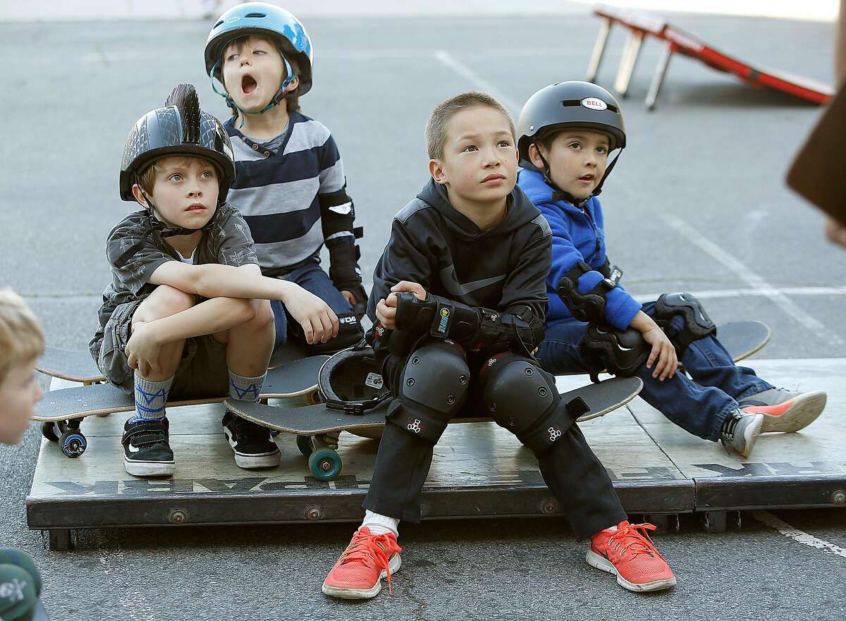 Left to right--Austin, Javier, Henry Martin, and Emilio Beltran take a skateboarding class called Shred 'n' Butter offered by San Francisco Recreation & Parks at in San Francisco, California, on friday, march 25, 2016.