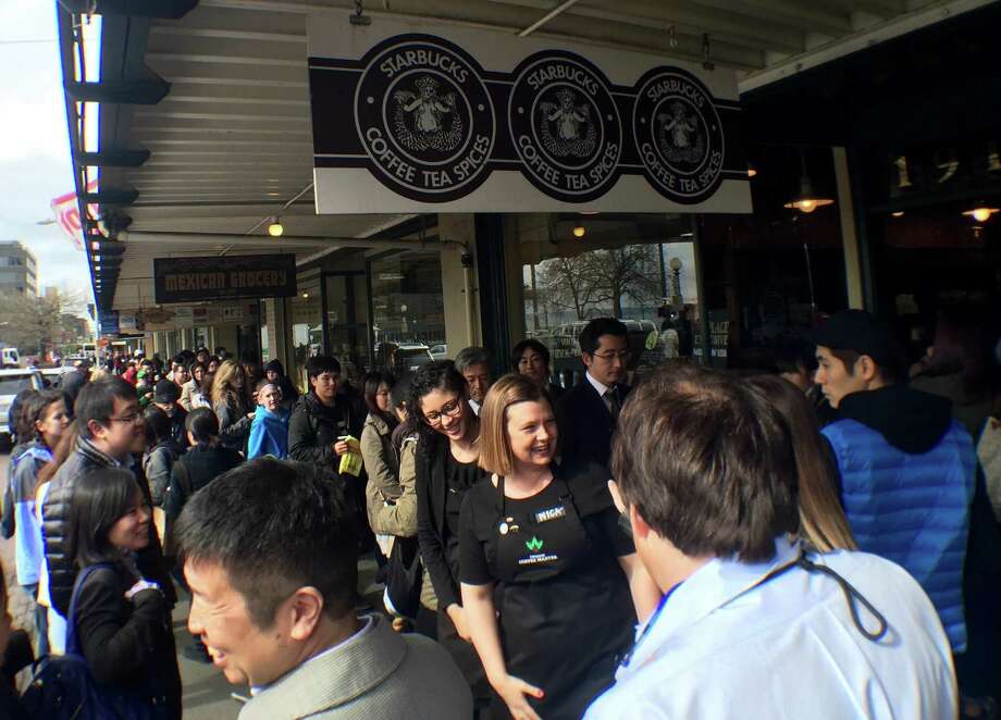 The customary line outside Starbucks19; oldest store in Pike Place Market, which forces all other pedestrians out in front of the misguided cars attempting to drive through Pike Place. All that and it's not even the actual original Starbucks.  Photo: Multiple