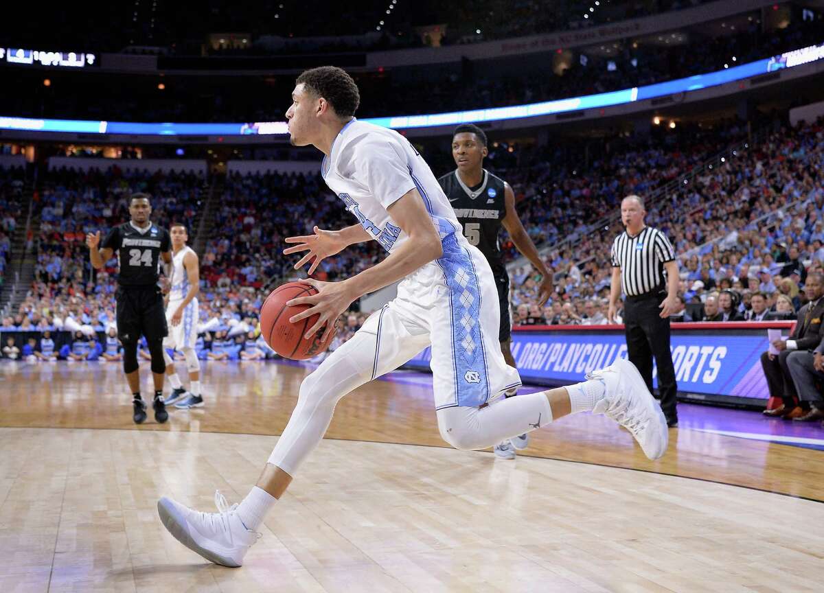 RALEIGH, NC - MARCH 19: Justin Jackson #44 of the North Carolina Tar Heels drives against the Providence Friars in the first half during the first round of the 2016 NCAA Men's Basketball Tournament at PNC Arena on March 19, 2016 in Raleigh, North Carolina.