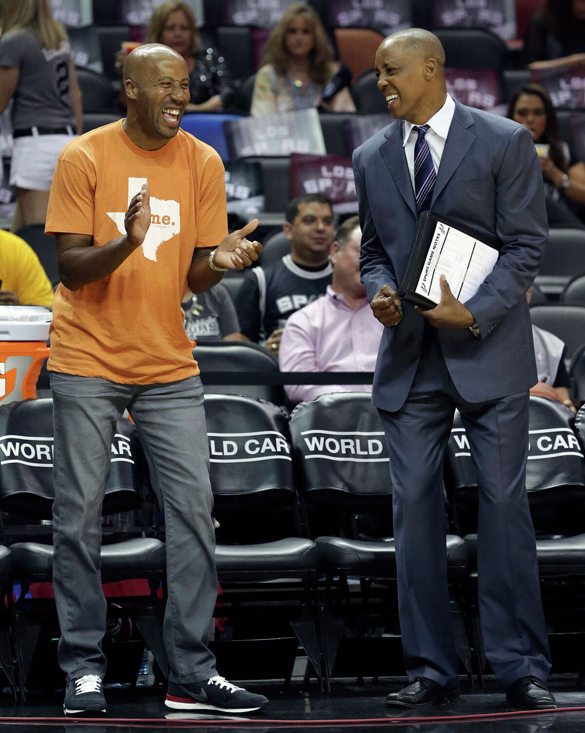 Bruce Bowen and Sean Elliott talk before the Spurs hosted the Denver Nuggets at the AT&T Center on April 3, 2015.