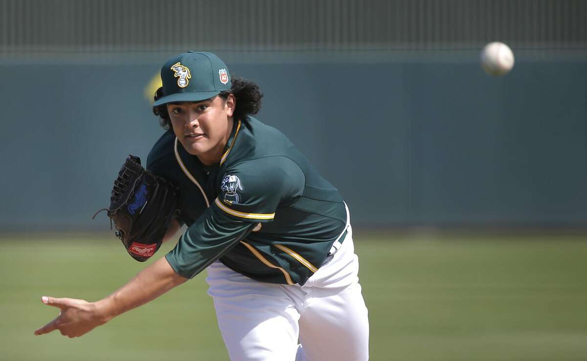 Sean Manaea throws during an intra-squad game at the Oakland Athletics spring training workouts in February in Mesa, Ariz.