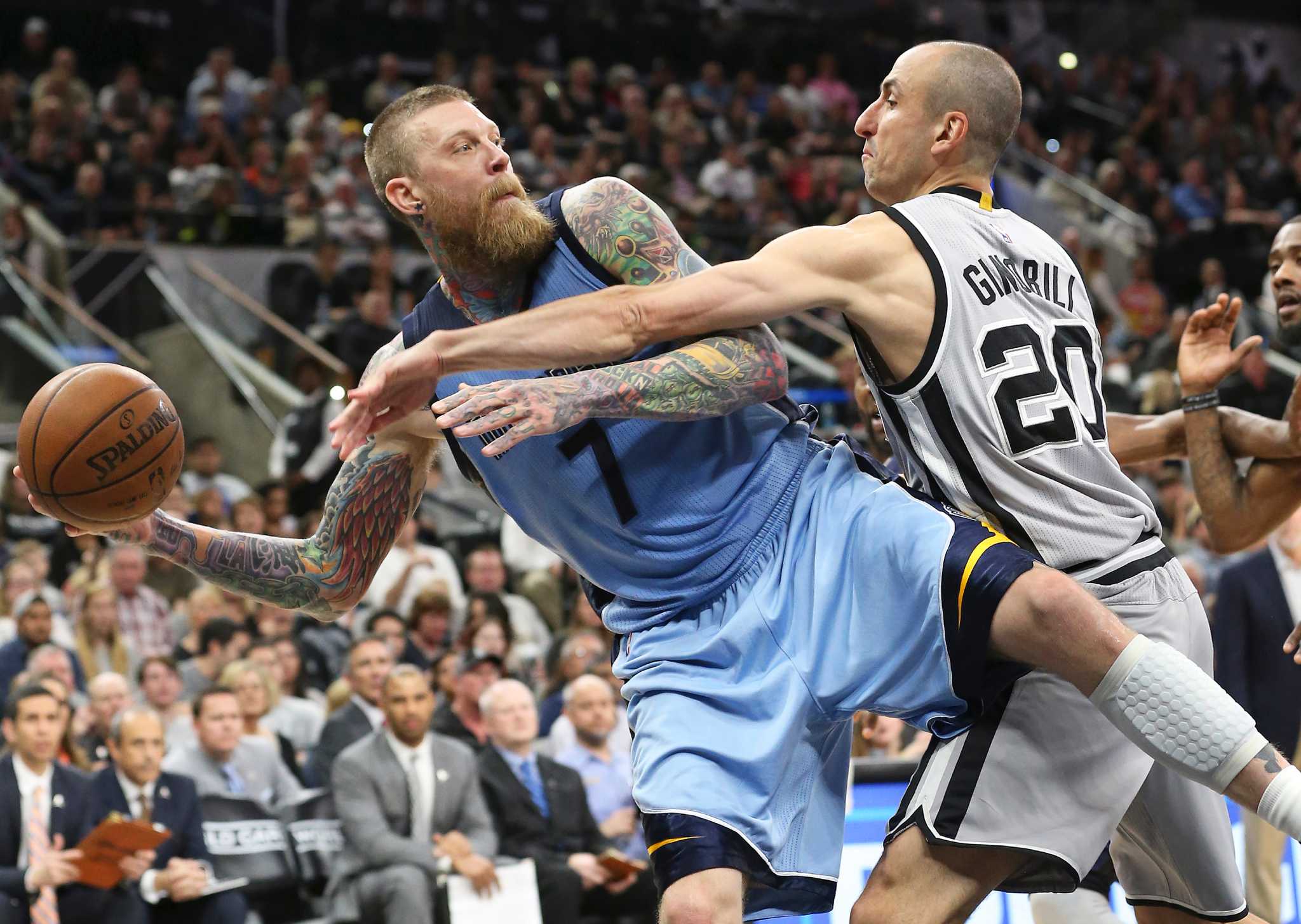 San Antonio Spurs center Boban Marjanovic (40) shoots against Memphis  Grizzlies forward Chris Andersen, right, in the second half of an NBA  basketball game Monday, March 28, 2016, in Memphis, Tenn. (AP